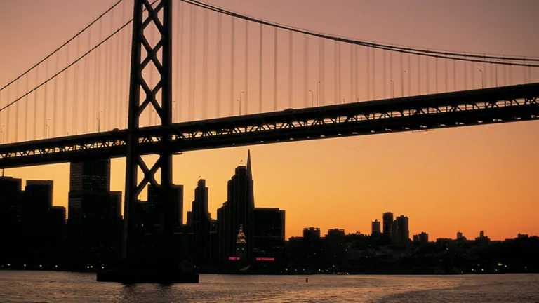 San Francisco-Oakland Bay Bridge at sunset.