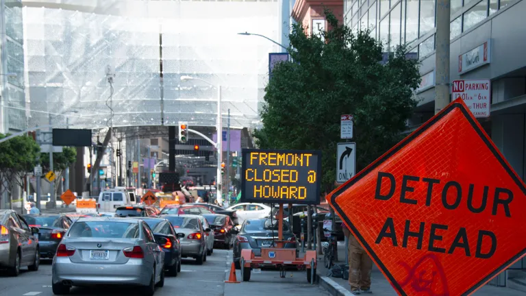 Traffic is being detoured around Fremont Street, which runs underneath the section of the Transit Center affected by the cracked beams. Visible in the distance are temporary posts reinforcing the affected area.