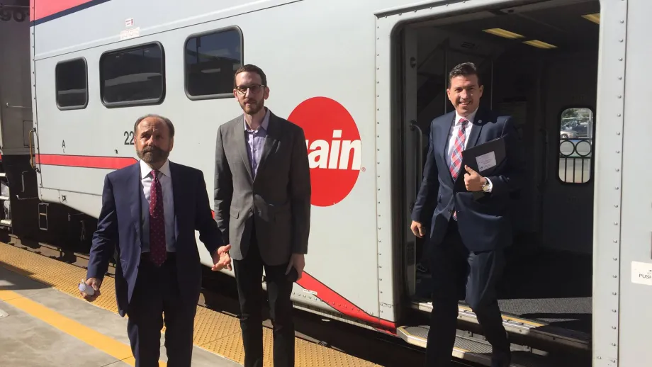 California senators Jerry Hill and Scott Wiener with Assemblyman Kevin Mullin getting of a train