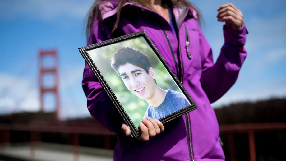 Guest carries a portrait of a lost loved one.
