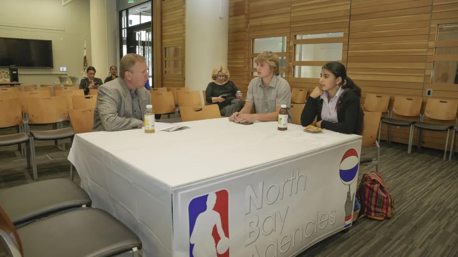 group of people at a North Bay Agencies table