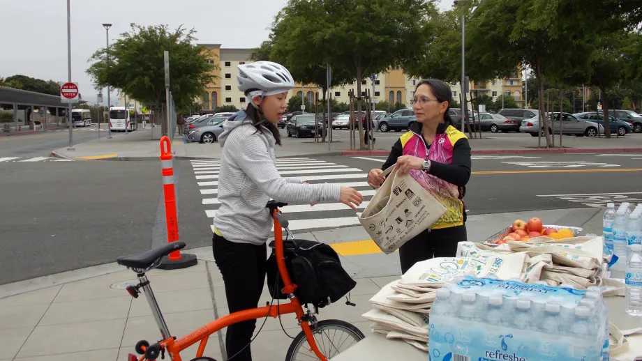Bike to Work Day messenger bags and healthy fruit snacks were the offerings at the Union City BART Energizer Station. 