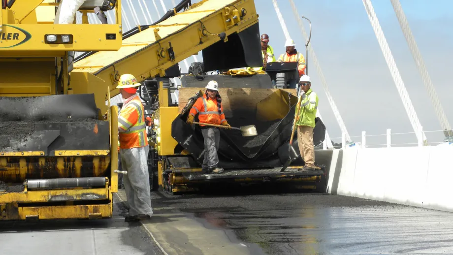 Paving the Self-Anchored Suspension Span