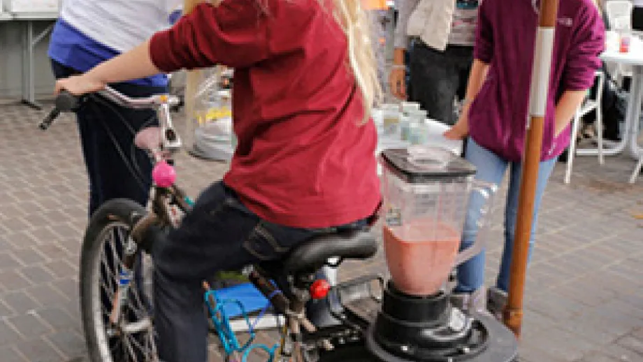 One student pedals her way to a smoothie, via YBike’s bike blender.