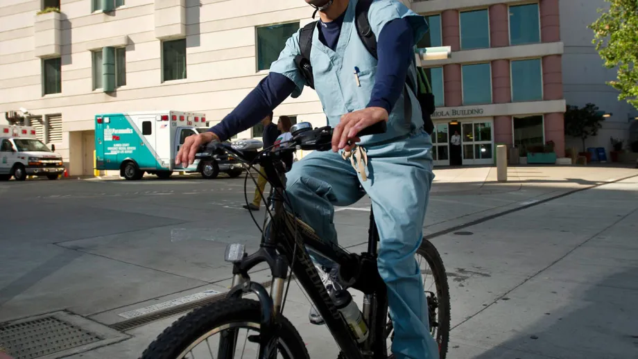 Saul Cristales, a worker in Kaiser Oakland’s orthopedics department, rides home after a shift on BTWD. Cristales bikes round-trip from his El Cerrito home daily. 